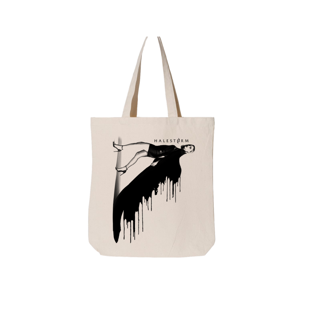 Canvas tote bag featuring a black and white graphic design of a reclining figure with dripping effect and ’HALESTORM’ text.